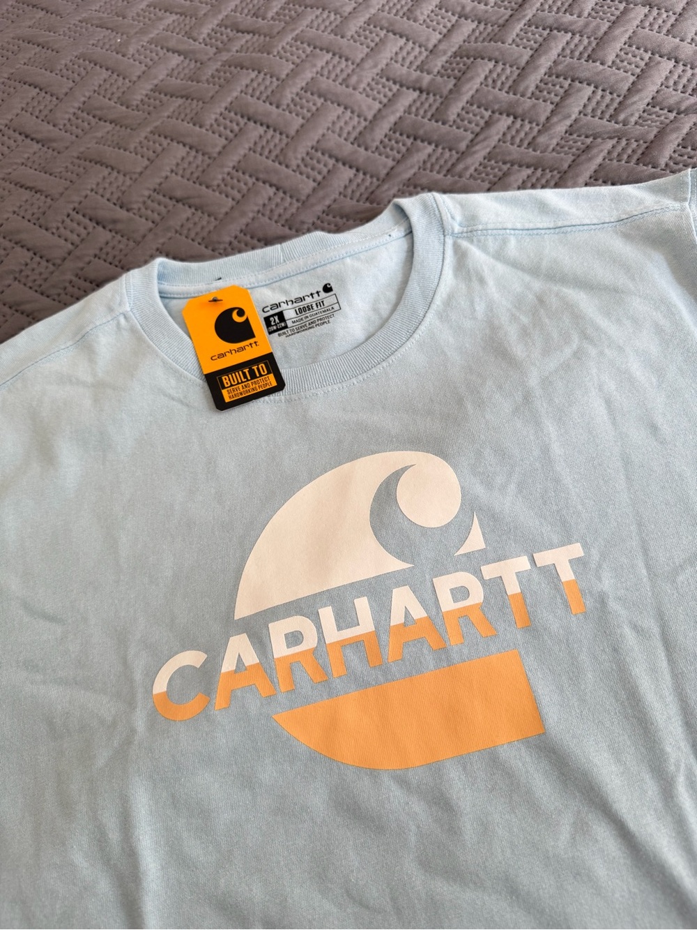Carhartt Pale Blue Tee with White and Orange Logo